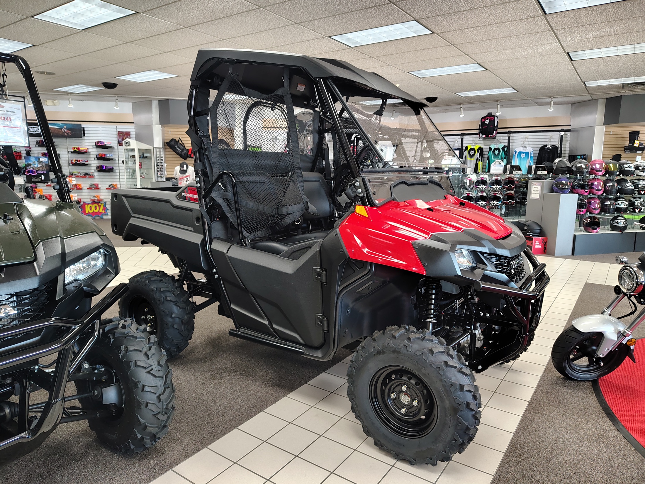 The actual red 2026 Honda Pioneer 700 being raffled by the Fordney Club